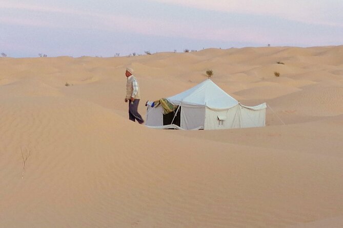 2 days tour to Douz & Ksar Ghilan oasis. and an overnight in the sahara under bedouin tent .. Dinner in the camp, Private Jeep - with english speaking guide. - Private Jeep with an English-speaking guide: value beyond comfort