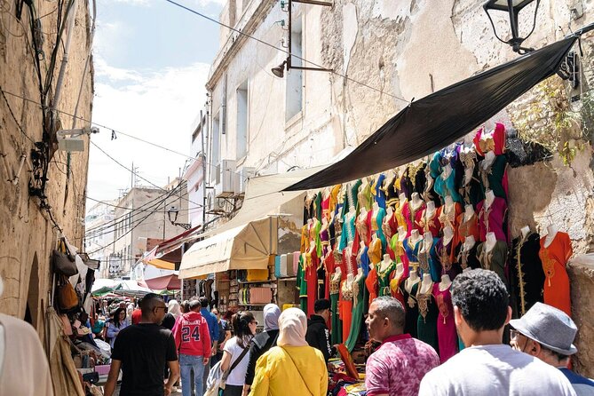 2 Hour Hergla Visit and Sousse Medina Heritage Tour - Crossing from quiet lanes to Sousse medina’s market logic