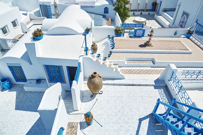 White rooftops and blue shutters of Sidi Bou Said above the Gulf of Tunis